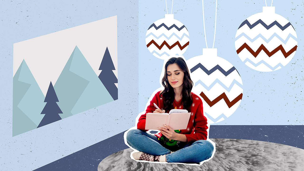 Eine Frau schreibt in ein Buch, dahinter eine Grafik mit Advents- und Weihnachtsdekoration