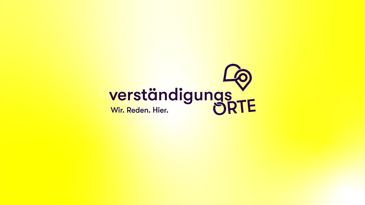 Wort "Verständigungsorte" auf gelbem Hintergrund